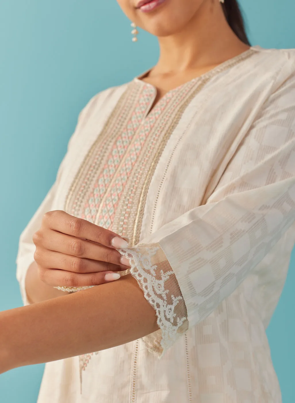 Ivory Textured Kurta set with Multicolor Embroidery